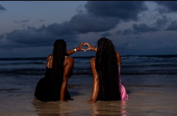 Sisters on beach
